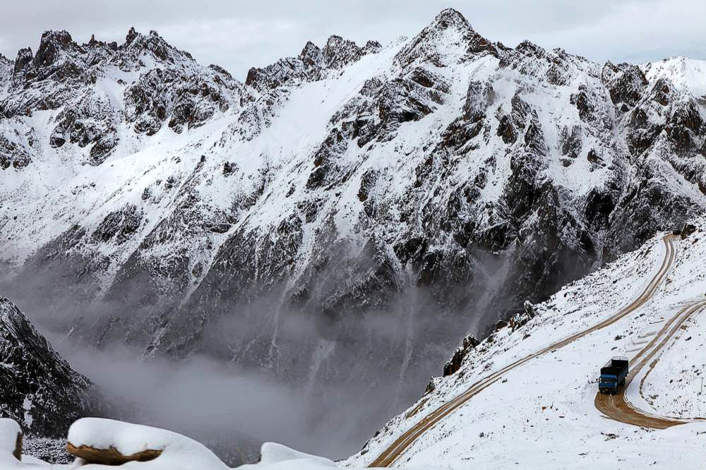 驢行川藏第一險——翻越冰雪覆蓋的雀兒山(組照)