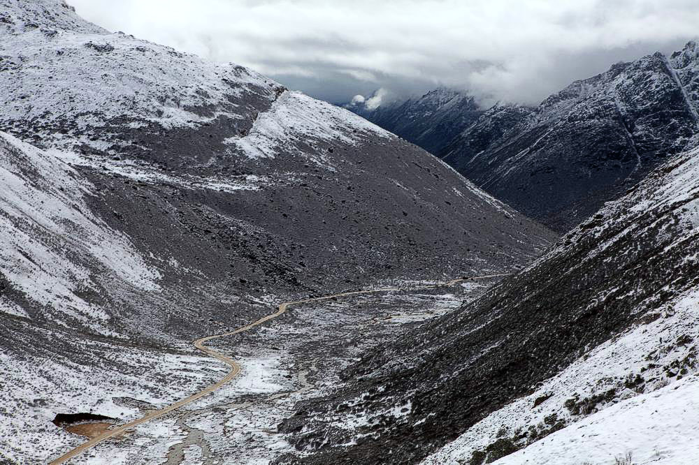 驢行川藏第一險——翻越冰雪覆蓋的雀兒山(組照)